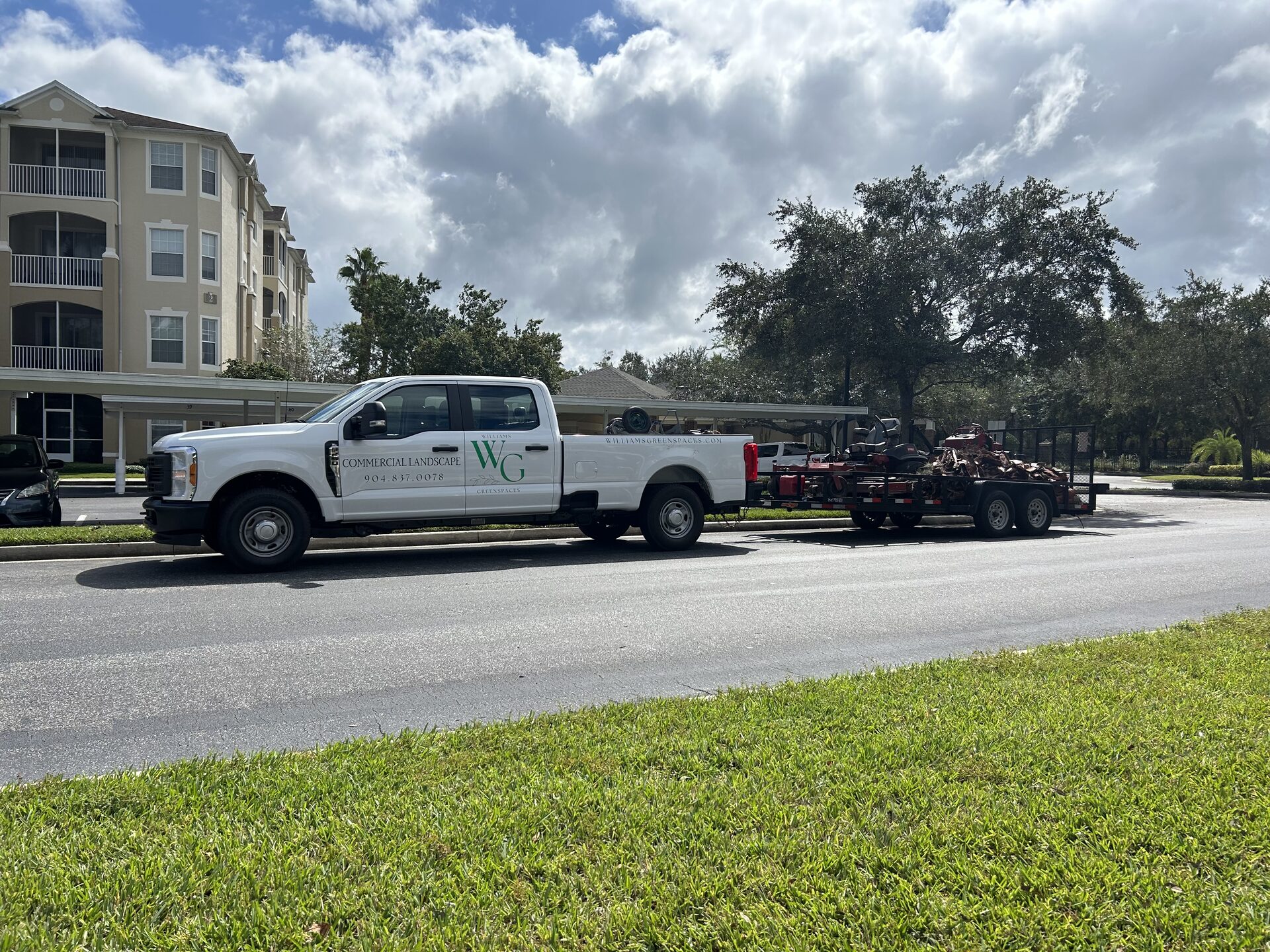 Williams Greenspaces commercial landscaping truck and trailer on site